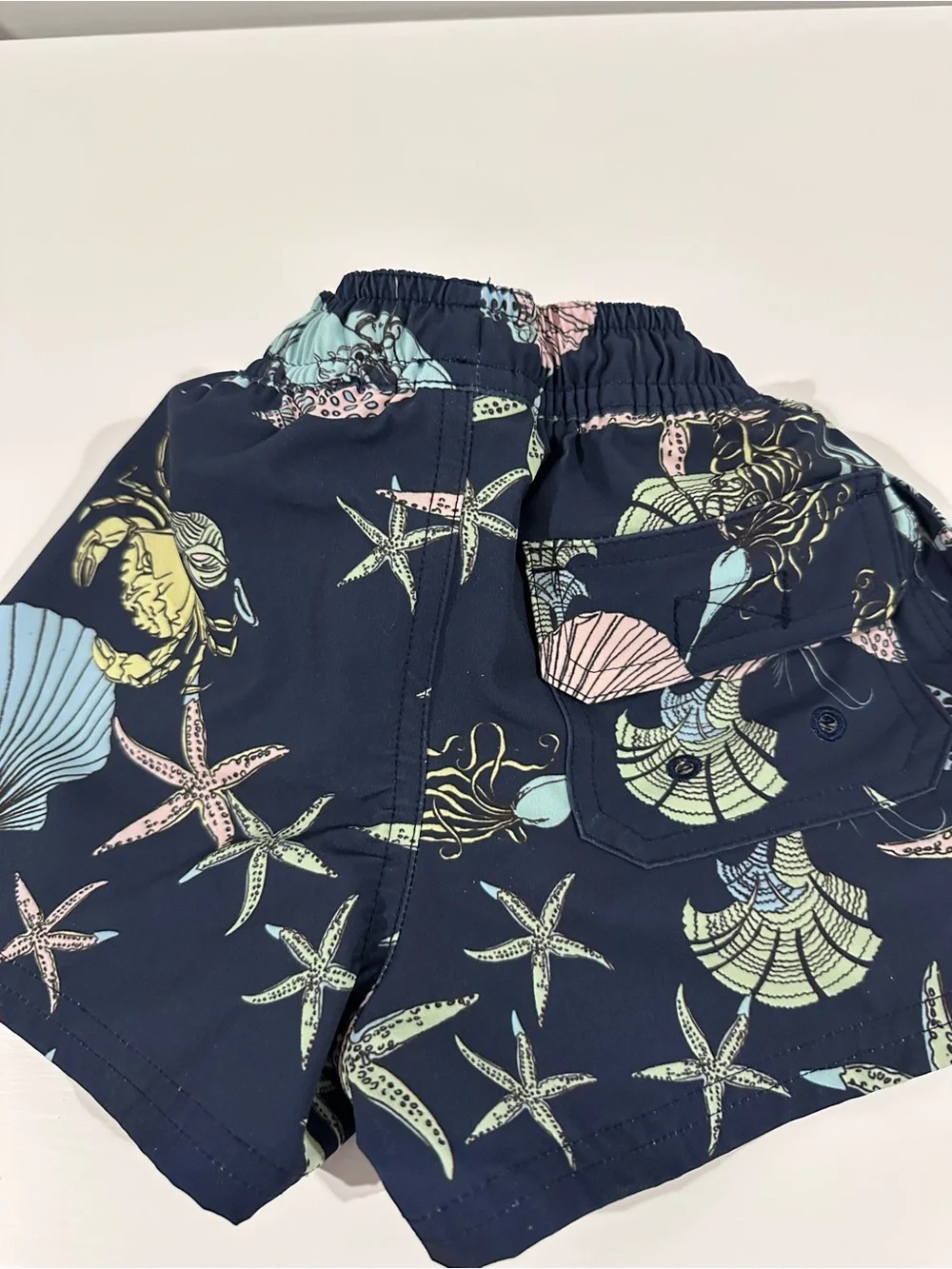 Vineyard Vines Navy Swim Trunks with Pastel Sea Life Print